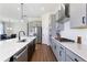 Stylish kitchen with a large island, stainless steel appliances, and modern cabinetry at 803 Levi Farms Ln, Canton, GA 30115