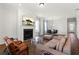 Spacious living room featuring a fireplace, hardwood floors, neutral palette and modern furnishings at 803 Levi Farm Ln, Canton, GA 30115