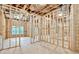 Unfinished basement with window provides natural light and possibilities for future living space at 10 Berryhill Se Pl, Cartersville, GA 30121