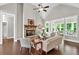 Cozy living room with a floor to ceiling stone fireplace, vaulted ceilings, and lots of natural light at 10 Berryhill Se Pl, Cartersville, GA 30121