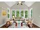 Cozy sunroom featuring large windows that let in lots of natural light at 10 Berryhill Se Pl, Cartersville, GA 30121