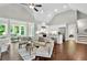 Bright living room with vaulted ceilings and an open layout that seamlessly connects to the modern kitchen at 10 Berryhill Se Pl, Cartersville, GA 30121