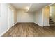 Finished basement with laminate floors and access to stairs and a separate room at 1034 Sandy Ridge Rd, Mcdonough, GA 30252