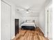 Clean bedroom with hardwood floors, a ceiling fan, and lots of light at 2297 Herring Woods Way, Grayson, GA 30017