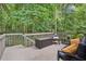 Inviting outdoor deck space with comfortable seating, ideal for relaxation and entertaining at 2297 Herring Woods Way, Grayson, GA 30017