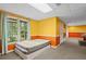 Basement bedroom with a window view and two twin mattresses at 2641 Loch Way, Snellville, GA 30039
