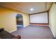 Finished basement area with large screen at 2641 Loch Way, Snellville, GA 30039