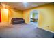 Finished basement features seating area with an opening to a game room at 2641 Loch Way, Snellville, GA 30039