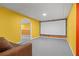 A view of the basement with a projector screen on the right wall at 2641 Loch Way, Snellville, GA 30039