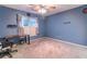 Bedroom with blue walls and carpet at 2641 Loch Way, Snellville, GA 30039