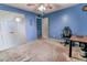 Spacious blue bedroom with closet and room to work at 2641 Loch Way, Snellville, GA 30039