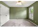 Bedroom featuring a ceiling fan, closet doors and natural light from one window at 2641 Loch Way, Snellville, GA 30039