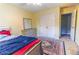 Cozy bedroom with closet, dresser, and connecting door at 2641 Loch Way, Snellville, GA 30039