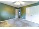Bedroom with carpet and entrance to en suite bathroom at 2641 Loch Way, Snellville, GA 30039