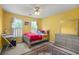 Bedroom with a ceiling fan, gray dresser and a silver colored bed frame at 2641 Loch Way, Snellville, GA 30039