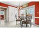Charming breakfast nook with a round table, built-in cabinets, and a view of the outdoors at 2641 Loch Way, Snellville, GA 30039