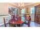 Traditional dining room featuring a wood table, chairs, and natural light at 2641 Loch Way, Snellville, GA 30039