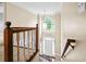 Sun-filled foyer with beautiful woodwork, large windows, and a view of the front door at 2641 Loch Way, Snellville, GA 30039