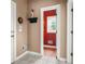 Entryway with neutral paint, tile flooring, and decorative accents at 2641 Loch Way, Snellville, GA 30039