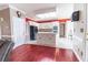 Bright kitchen with white cabinets, island, and modern appliances at 2641 Loch Way, Snellville, GA 30039
