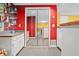 View of a wet bar with a sink, mirror doors, and overhead lighting at 2641 Loch Way, Snellville, GA 30039