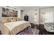 Bedroom featuring hardwood floors and built-in shelving at 2660 Peachtree Nw Rd # 13H, Atlanta, GA 30305