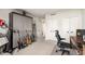 Bedroom/Office featuring a Murphy bed and built in shelving, ready for music or work at 2660 Peachtree Nw Rd # 13H, Atlanta, GA 30305