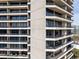 Angle view of the building showcasing balconies for each unit with floor to ceiling windows at 2660 Peachtree Nw Rd # 13H, Atlanta, GA 30305