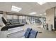 Community gym with state of the art equipment and floor to ceiling windows at 2660 Peachtree Nw Rd # 13H, Atlanta, GA 30305