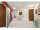 Hallway featuring tile flooring, flush lighting and a decorative sliding door at 2660 Peachtree Nw Rd # 13H, Atlanta, GA 30305