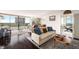 Inviting living room with floor-to-ceiling windows and an adjoining dining area at 2660 Peachtree Nw Rd # 13H, Atlanta, GA 30305