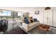 Inviting living room with floor-to-ceiling windows and an adjoining dining area at 2660 Peachtree Nw Rd # 13H, Atlanta, GA 30305