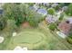 This beautiful property is on a golf course with a private pool surrounded by mature landscaping at 5589 Forkwood Nw Dr, Acworth, GA 30101