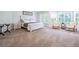 Bright bedroom showcasing a large window seating area and neutral carpet at 5589 Forkwood Nw Dr, Acworth, GA 30101