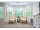 Bedroom sitting area featuring large bay windows and lots of natural light at 5589 Forkwood Nw Dr, Acworth, GA 30101