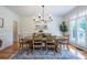 Dining room features hardwood floors, natural light, and ample seating at 5589 Forkwood Nw Dr, Acworth, GA 30101