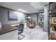 Modern home office features a large desk, comfortable seating, and ample workspace for productivity at 5589 Forkwood Nw Dr, Acworth, GA 30101