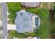 A beautifully designed home with a private backyard featuring a sparkling in-ground pool and mature trees at 5589 Forkwood Nw Dr, Acworth, GA 30101