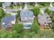 A spacious home with a stone patio and an in-ground pool nestled in a beautifully landscaped backyard at 5589 Forkwood Nw Dr, Acworth, GA 30101