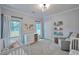 Neutral-toned Bedroom with cribs, a dresser, and soothing decor at 1443 Metropolitan Se Ave, Atlanta, GA 30316