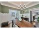 Cozy dining room with a large table, sophisticated decor, and access to other rooms at 1443 Metropolitan Se Ave, Atlanta, GA 30316