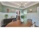 Classic dining area featuring modern lighting, neutral colors, and wood accents at 1443 Metropolitan Se Ave, Atlanta, GA 30316