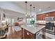 Modern kitchen featuring granite countertops, stainless steel appliances, and hardwood floors at 1443 Metropolitan Se Ave, Atlanta, GA 30316