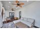 Beautifully designed sunroom with hardwood floors, recessed lighting and white furniture at 1443 Metropolitan Se Ave, Atlanta, GA 30316