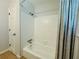 Bathroom featuring shower/tub combination and classic white tile at 3210 Ebenezer Rd, Marietta, GA 30066