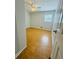 Cozy bedroom with hardwood floors and a large window for natural light at 3210 Ebenezer Rd, Marietta, GA 30066