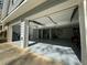 Three-car garage showcasing its epoxy flooring with lawn equipment and easy access at 3210 Ebenezer Rd, Marietta, GA 30066