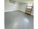 Spacious garage features a smooth epoxy floor, shelving, and a window at 3210 Ebenezer Rd, Marietta, GA 30066