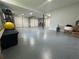 Large garage offers epoxy floors, shelving, two doors, and plenty of room for storage at 3210 Ebenezer Rd, Marietta, GA 30066