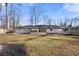 Backyard exterior shot of this home, featuring a lawn at 380 Atwood Nw Dr, Marietta, GA 30064